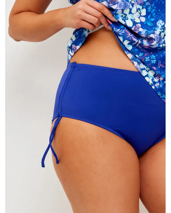 Close-up of the blue Vera tankini bottom with its side tie